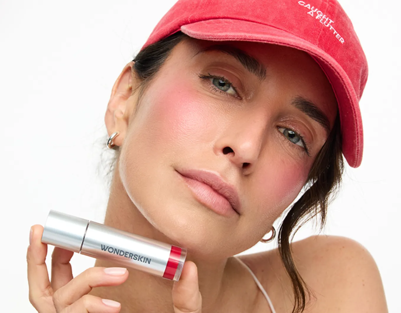 <h4 style='font-style:italic;font-weight:100;font-size:30px;line-height:30px;'><span style='color:#ffffff;'>'I love the glowy finish and the sheer shade of pink that is personal to me'</h4>